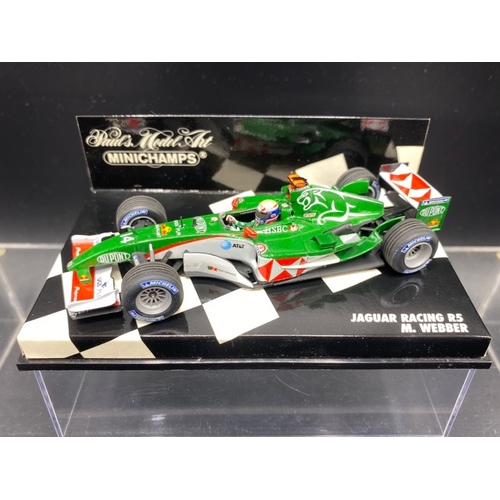 6 - 6 Paul’s Model Art MINICHAMPS racing cars (1:43 scale) (700g)
Includes:
Stewart Ford SF 1  - J. Magn... 
