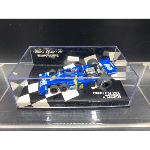 6 - 6 Paul’s Model Art MINICHAMPS racing cars (1:43 scale) (700g)
Includes:
Stewart Ford SF 1  - J. Magn... 