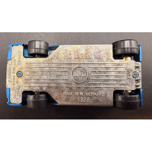 37 - 6 Siku Germany Vehicles and 2 Trailers (circa 1970's) in Good condition
Includes: 
Mercedes Benz L 4... 