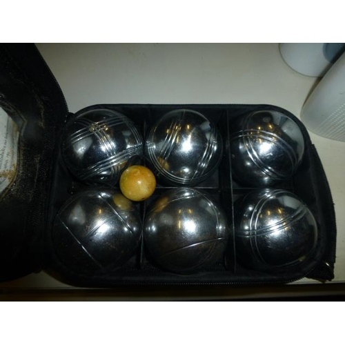 696 - CASED BOULES