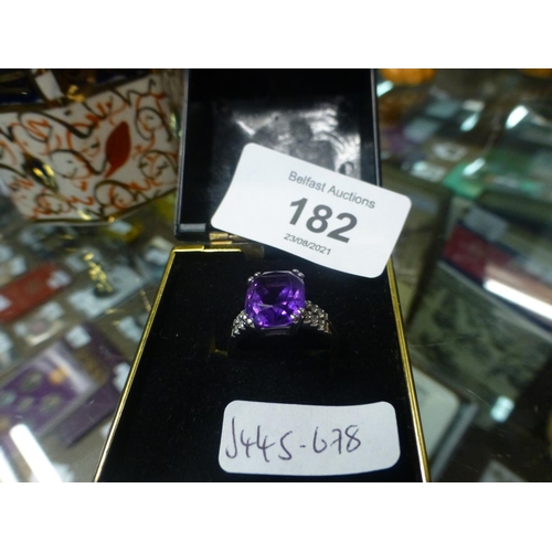 182 - 9CT WHITE GOLD AND AMETHYST RING