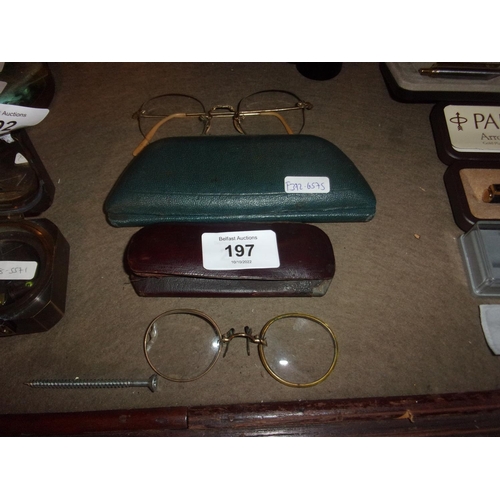 197 - OLD BELFAST SPECTACLES HARRIS RUNDLE IN GOLD COLOUR FRAMES AND CASED PINZNEZ