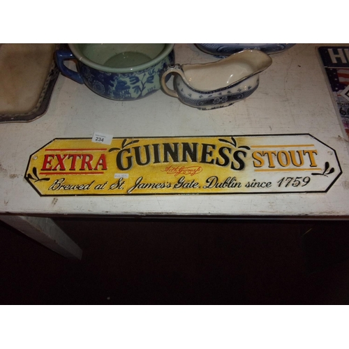 234 - CAST GUINNESS SIGN