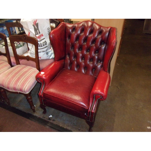 480 - OXBLOOD CHESTERFIELD WINGBACK ARMCHAIR