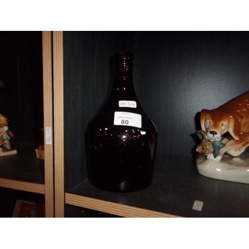 80 - BROWN GLASS IRISH BOTTLE