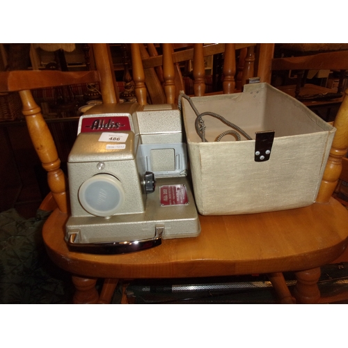 486 - VINTAGE SLIDE PROJECTOR WORKING NEEDS NEW CABLE