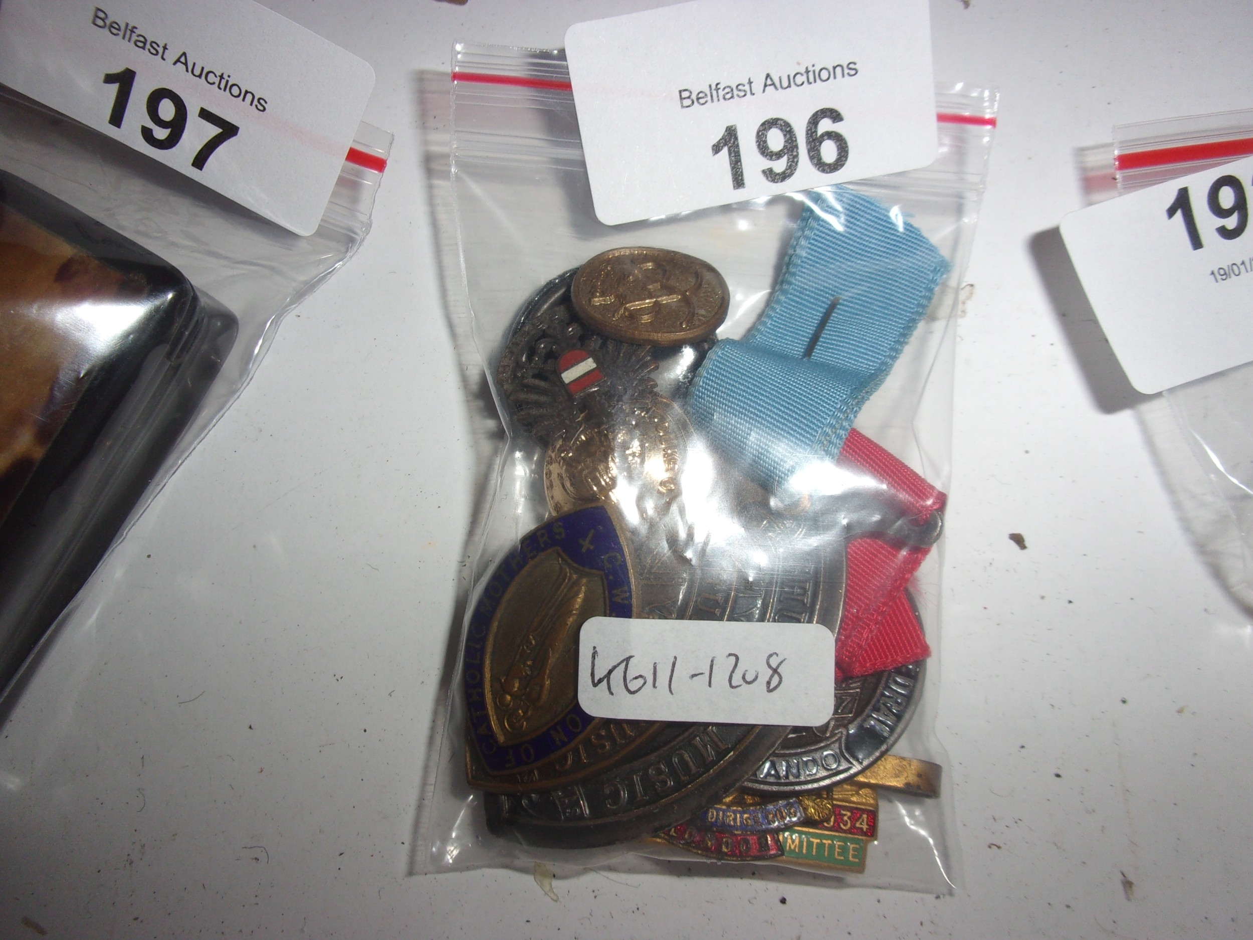 BAG OF ENAMEL BUTLINS BADGES AND PINS
