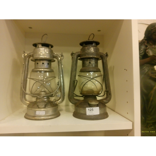 125 - 2 STORM LANTERNS