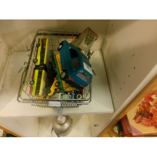 128 - BASKET OF MODEL CARS ETC