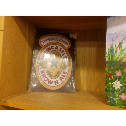 140 - SMALL TIN SIGN