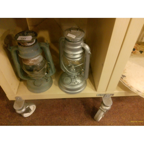 153 - 2 STORM LAMPS