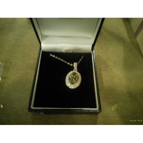 174 - BOXED CRYSTAL AND GEMSTONE PENDANT ON SILVER CHAIN