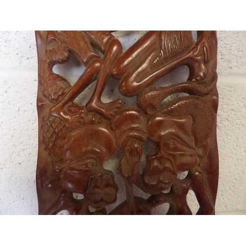 33 - A large African Carved Wooden Plaque