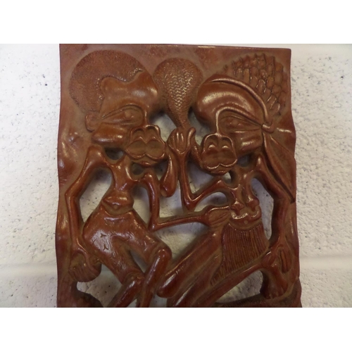 33 - A large African Carved Wooden Plaque