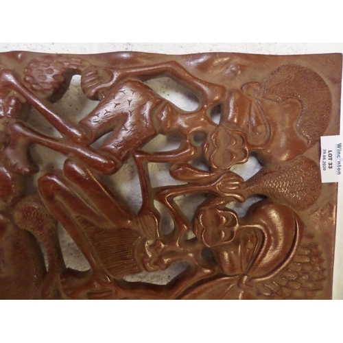 33 - A large African Carved Wooden Plaque