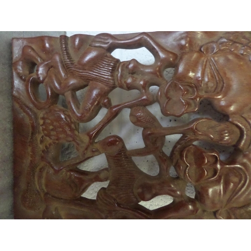 33 - A large African Carved Wooden Plaque