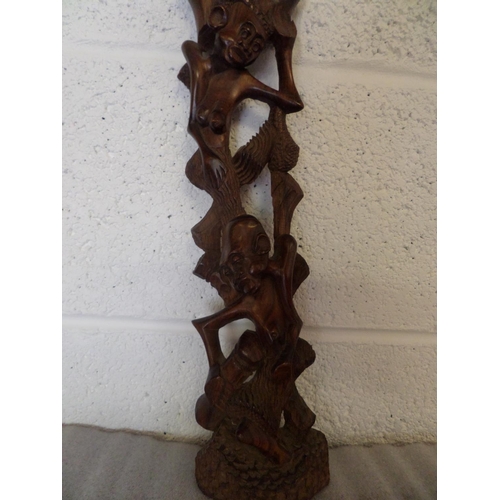 34 - A tall Hand Carved African wooden statue