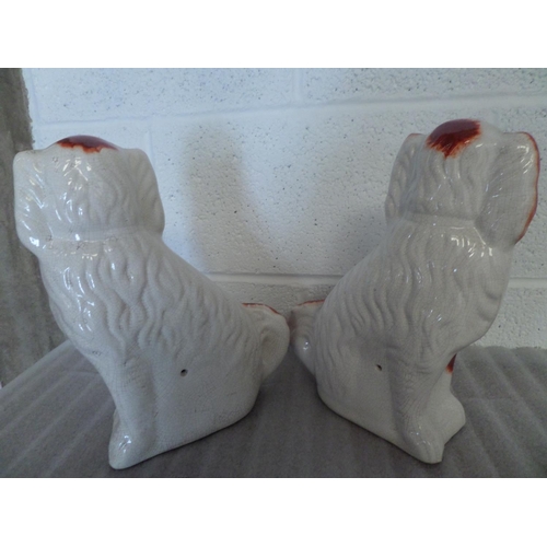 77 - A Pair of 12 inch Staffordshire Fire Dogs