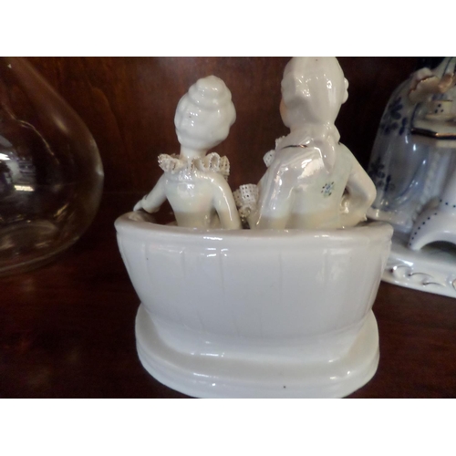 112 - 2 x Porcelain Figurines, Tea party and Courting Couple