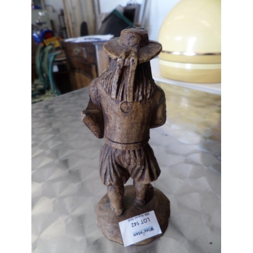 142 - Small carved Wooden Figure of a man playing bagpipies and Wooden Massager