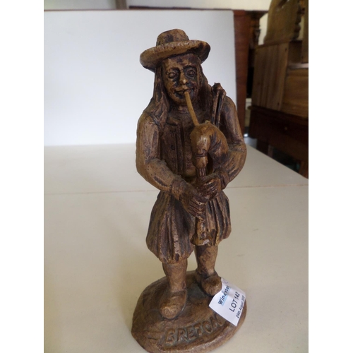 142 - Small carved Wooden Figure of a man playing bagpipies and Wooden Massager