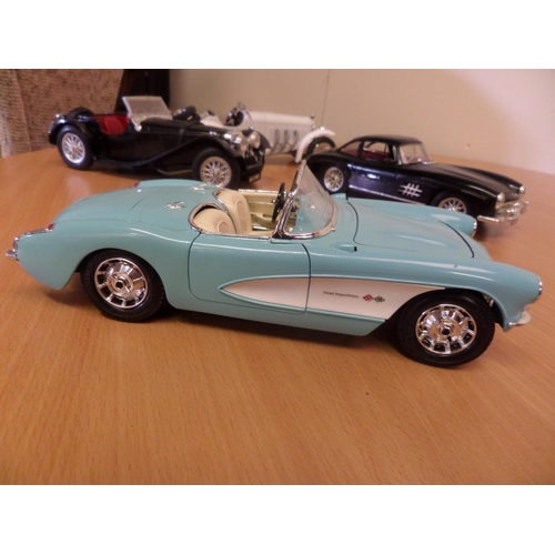 238 - 4 x Burago Models 1:18 Made in Italy 
1. Chevrolet Corvette 1957
2. Mercedes 300 SL
3. Jaguar SS100 ... 