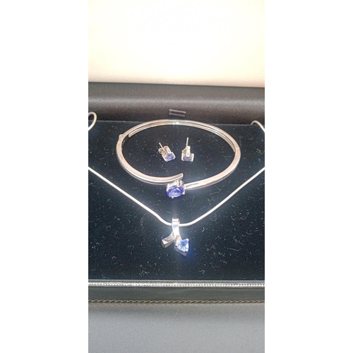 13 - .925 Silver and Tanzanite Necklace , Bracelet and Earring Set