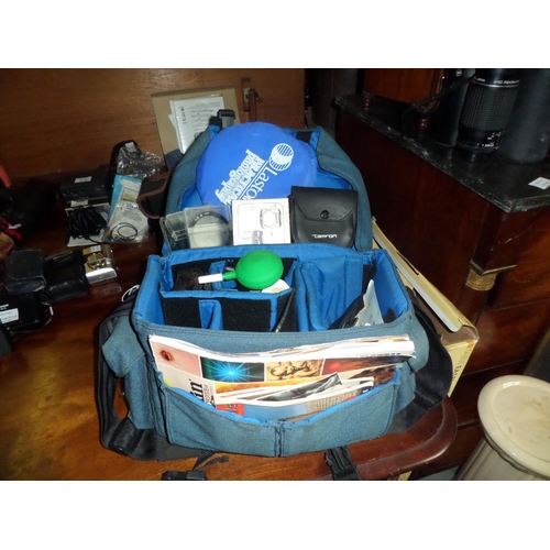 235b - Blue Bag Containing Camera Accessories