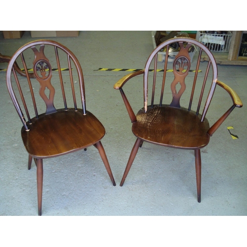 93 - Ercol Dining Table and 8 Chairs (2 Carvers)