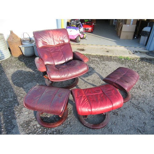 645 - A Burgandy Swivel Reclining Chair and 3 Foot Stools