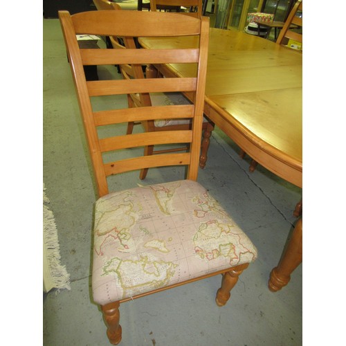 66 - A Pine Dining Table and 6 Chairs with 2 Additional Leaves