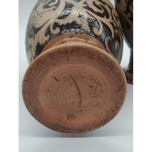 19a - A pair of R.W. Martin Brothers Early Stoneware Vases, 1884, incised and impressed stylised Cherubs a... 
