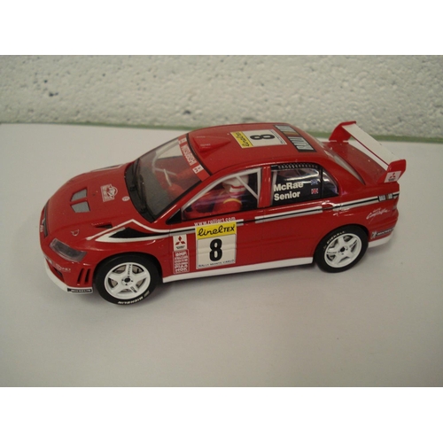 83 - A Hornby Scalextric Mitsubishi Lancer WRC Rally Car