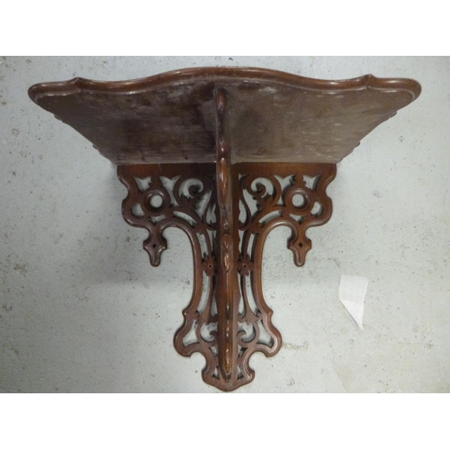 73 - An Ornate Wooden Shelf