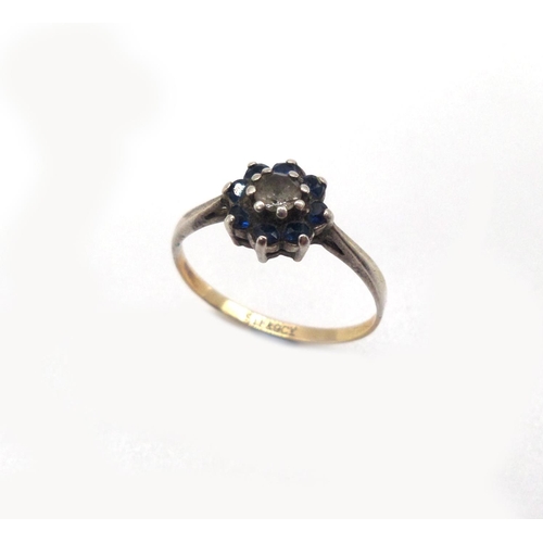 24 - 9ct Gold and Silver Ring with Blue and Clear Stones in a Floral design, size Q, Boxed