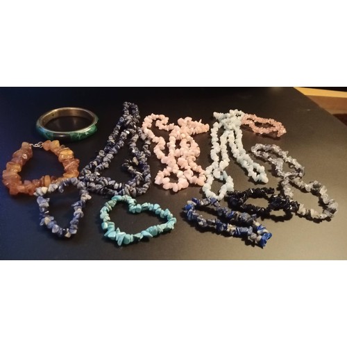 105 - A Quantity of Natural Stone and Amber Necklaces and Bracelets