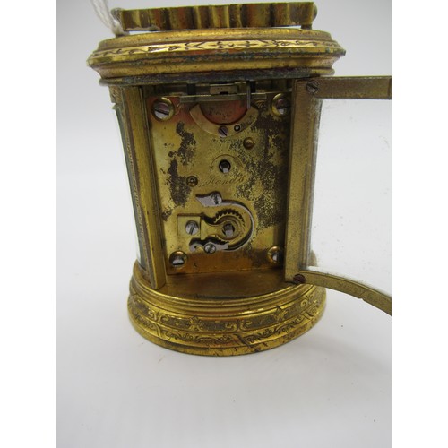 78a - Small J.W. Benson Oval Brass Carriage clock, The Dial Signed Benson Bond St, Engraved throughout wit... 