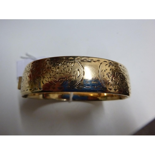 216 - 9ct Gold Plated Gold Bangle