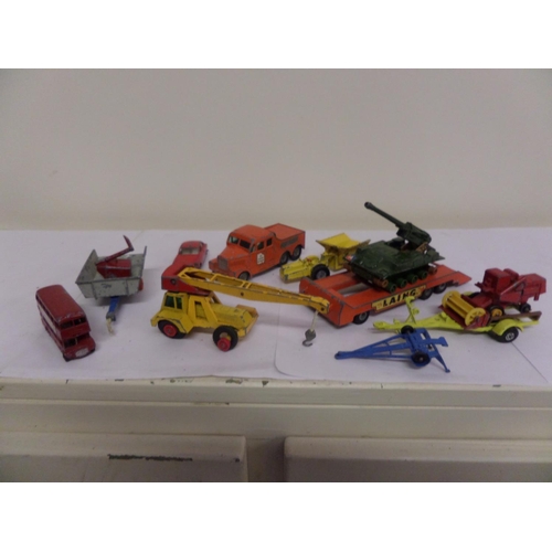 142 - A Box of model vehicles, mainly trucks and Trailers, Matchbox etc