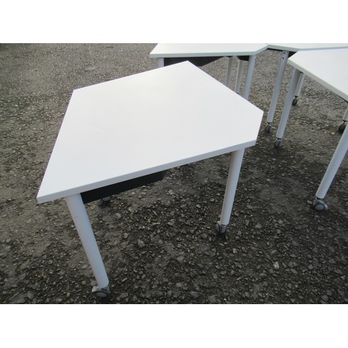 205 - A White 4 Piece Modular Office Table Set on lockable wheels