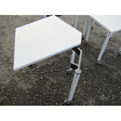 205 - A White 4 Piece Modular Office Table Set on lockable wheels