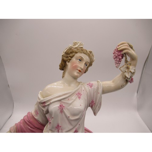 146 - A Continental Porcelain Figurine of a Lady Holding Grapes and a Goblet 37cm Tall , Unknown Makers Ma... 