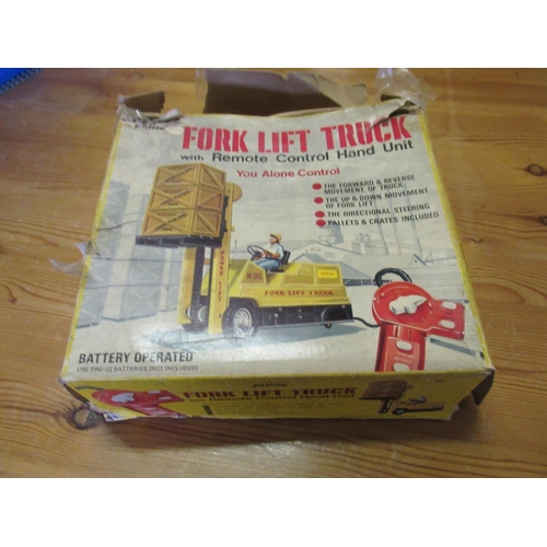 418 - Palitoy 'Remote control hand unit' Forklift Truck - **Driver missing an arm!**