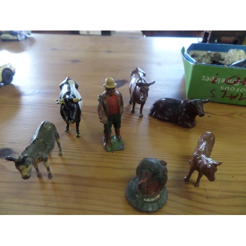 425 - A Collection of Vintage Farm Animals and other Figures