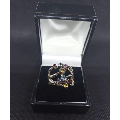 33b - 925 Silver Ring with multicoloured stones. 6.46gms size k/l