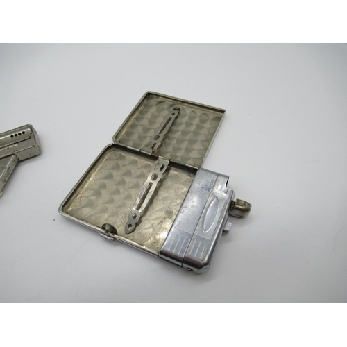 113 - A Collection of Tobacciana including a  IMCO 6900 Pistol Lighter, Cigarette Case with Built in Light... 