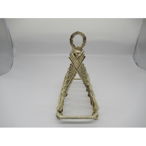 57b - A Silver Plated Toast Rack in the Form of 14 Rifles/ Crossed Muskets