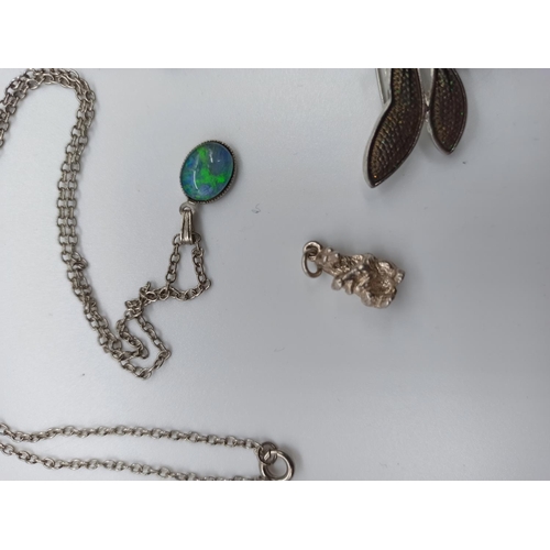 32d - A Marquisette Brooch, Bracelet Charm and Other White Metal Jewellery