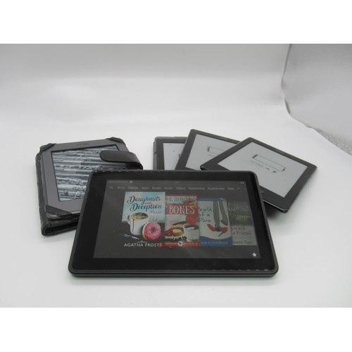 115b - A Kindle Fire and other Kindles (as found) - no chargers