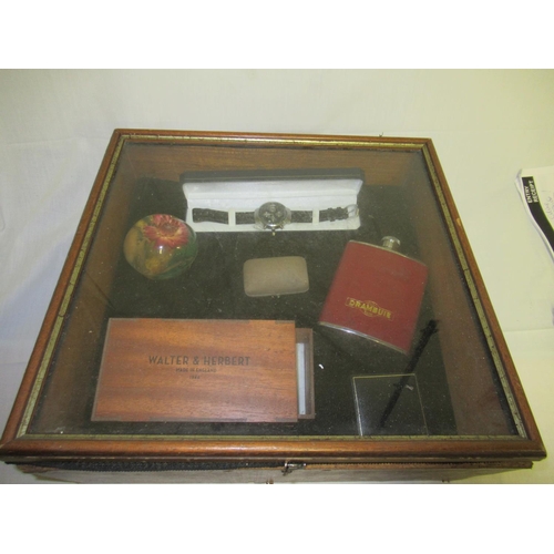 43 - A Small Display Case 38 x 38 x 17cm and Contents Including Watch, Drambuie Flask etc.